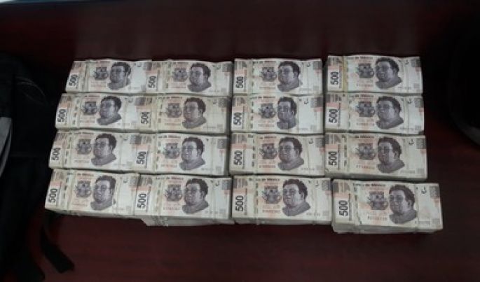 Decomisa la PGR armas y cerca de cuatro millones de pesos en la Ciudad de México