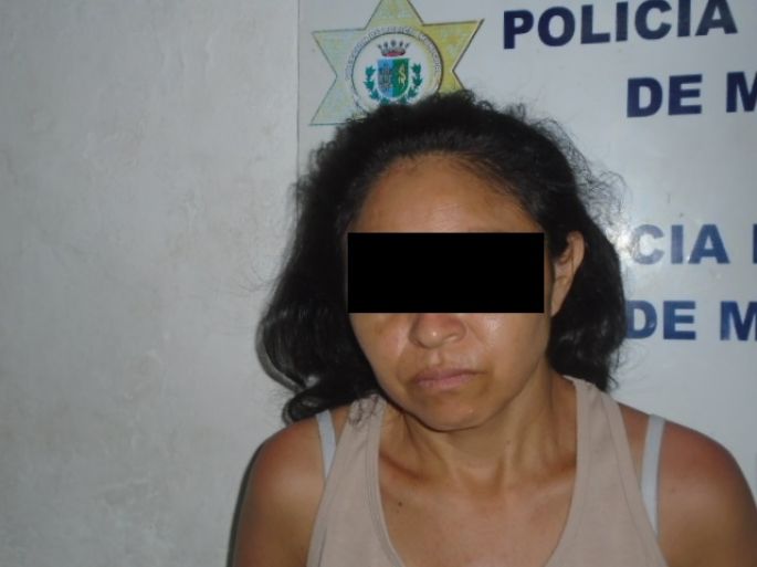 Detienen a dama en terminal de camiones con pistola y 49 cartuchos útiles 